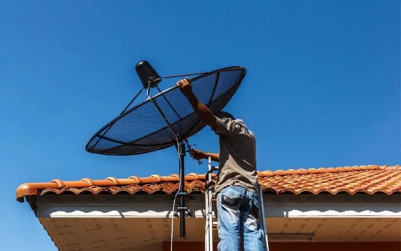 Satellite internet antenna being installed on the roof